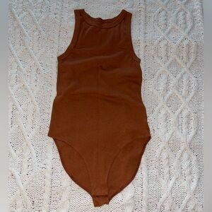 A NEW DAY BODYSUIT